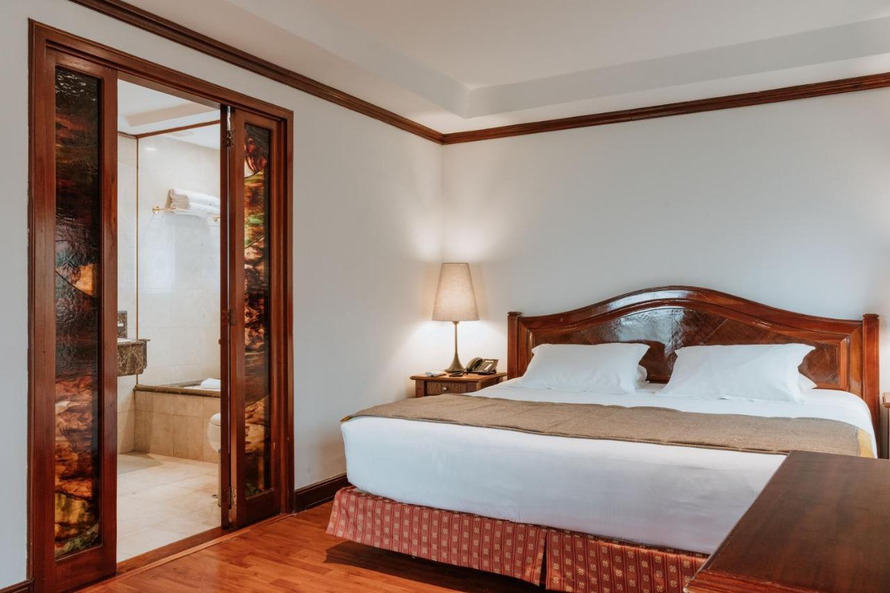 Hotel Park10 Medellín Dış mekan fotoğraf A bedroom at the hotel